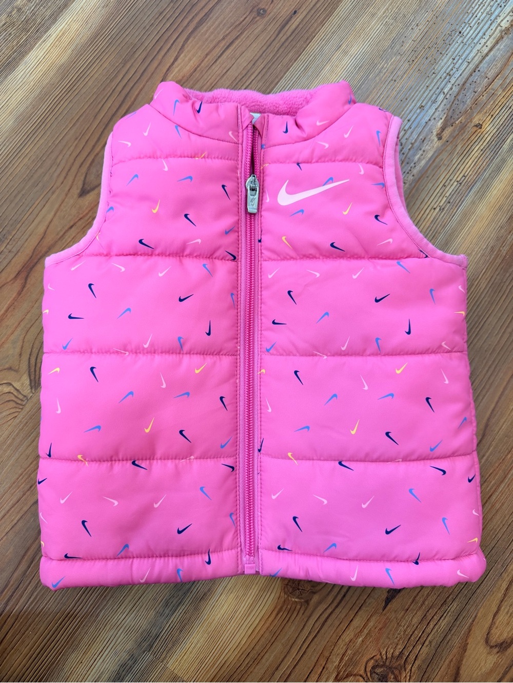 Nike Kids Pink Puffer Vest with Multicolor Swoosh Accents